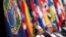 FILE - The logo of the Organization for the Prohibition of Chemical Weapons (OPCW) is seen during a special session in the Hague, Netherlands, June 26, 2018. 