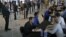 Job applicants receive interviews by Florida Marlins staff at Marlins Park in Miami, Florida, October 24, 2012.