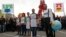 People demonstrate during the World Climate Change Conference 2015 (COP21) at Le Bourget, near Paris, France, Dec. 8, 2015. 