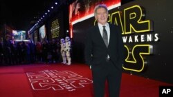 Harrison Ford poses for photographers upon arrival at the European premiere of the film 'Star Wars: The Force Awakens ' in London, Dec. 16, 2015.