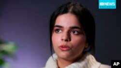 In this image made from a video, Rahaf Mohammed al-Qunun, Saudi woman accepted as a refugee in Canada, is interviewed in Toronto, Jan. 14, 2019. (Australian Broadcasting Corporation via AP)