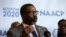 In this Thursday, Dec. 12, 2019 file photo, National Association for the Advancement of Colored People President Derrick Johnson faces reporters during a news conference in Boston.