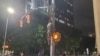 A Confederate statue is seen hanging on a street post in Raleigh, North Carolina, U.S. June 19, 2020 in this picture obtained from social media. 