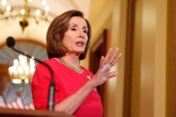 House Speaker Nancy Pelosi of Calif. speaks outside her office on Capitol Hill, Monday, March 23, 2020.