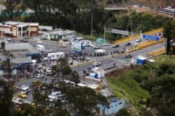 A general view shows Venezuelans gathering to cross into Ecuador from Colombia at the Rumichaca border bridge in Tulcan, Ecuador, Aug. 26, 2019.