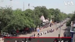 بازگشایی راه‌آهن شلوغ هند و تلاش برای رعایت بهداشت در زمان کرونا