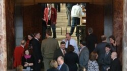 Lobbyists gather in the Capitol Rotunda in Lincoln, Nebraska, as state lawmakers debate on the floor of the Legislature in February 2009