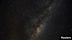 FILE - A view of the Milky Way is seen from an area of Puyehue National Park, near Osorno City, Chile, May 8, 2008. 