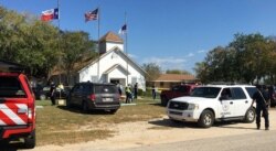 FILE - Emergency personnel respond to a fatal shooting at a Baptist church in Sutherland Springs, Texas, Nov. 5, 2017.