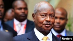 Uganda's President Yoweri Museveni (front R) arrives for the Heads of States and Governments International Conference on the Great Lakes Region in Nairobi July 31, 2013. 