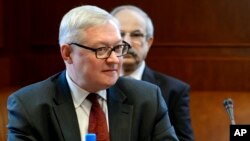 FILE - Russian Deputy Foreign Minister Sergei Ryabkov is seen during talks at United Nations offices in Geneva, Switzerland, Oct. 15, 2013. Ryabkov was to meet Friday with U.S. Undersecretary of State Thomas Shannon.