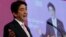 Japan's Prime Minister Shinzo Abe delivers the opening keynote address for the 13th International Institute for Strategic Studies (IISS) Asia Security Summit: The Shangri-La Dialogue, in Singapore May 30, 2014.
