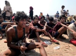 FILE - Bangladesh's coast guard rescued 382 starving Rohingya refugees and delivered them for processing in Cox's Bazar, Bangladesh, April 16, 2020.