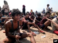FILE - Bangladesh's coast guard rescued 382 starving Rohingya refugees and delivered them for processing in Cox's Bazar, Bangladesh, April 16, 2020.