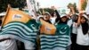 Youths take part in a protest rally in Lahore, Pakistan, Oct. 27, 2019, to mark "Black Day" in support of the people living in India-administered Kashmir.