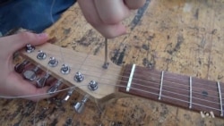 Students Learn About Science by Building Guitars