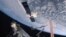 FILE - In this April 17, 2015, image from NASA-TV, the SpaceX Dragon 6 resupply capsule nears the International Space Station. 