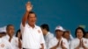 Cambodian Prime Minister Hun Sen waves to supporters during his Cambodian People's Party's campaign in Phnom Penh, Cambodia, Saturday, July 7, 2018. The official campaigning period for July 29 general election began with Hun Sen's ruling party virtually a