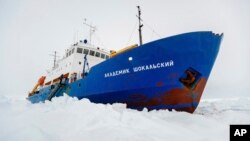The Russian ship MV Akademik Shokalskiy is trapped in thick Antarctic ice 1,500 nautical miles south of Hobart, Australia, Dec. 27, 2013.