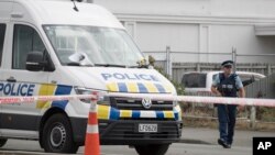 A police officer stands guard outside the Linwood mosque in Christchurch, New Zealand, March 19, 2019. 