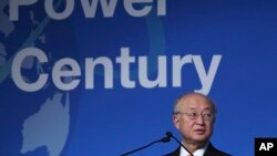 FILE - In this Oct. 30, 2017, photo, Yukiya Amano, the head of the International Atomic Energy Agency, speaks at a United Nations conference in Abu Dhabi. The U.N. agency monitoring Iran’s compliance with a landmark nuclear treaty issued a report Nov. 13,