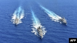 FILE - A handout photo released by the Greek National Defense Ministry Aug. 26, 2020, shows ships of the Hellenic Navy taking part in a military exercise in the eastern Mediterranean Sea, Aug. 25, 2020.