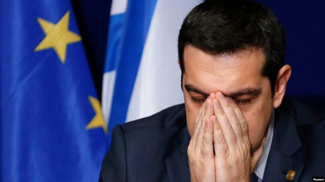 Greece's Prime Minister Alexis Tsipras addresses a news conference after an European Union leaders summit in Brussels, February 12, 2015.