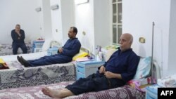 A picture taken during a guided tour organized by the Egypt's State Information Service on Nov. 11, 2019, shows inmates receiving treatment at the Tora prison clinic in the Egyptian capital Cairo.