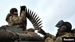 Ukrainian service members load ammunition during Russia's ongoing attack on Ukraine in Zaporizhzhia region, Ukraine, Jan. 23, 2023. A secret supply of Bulgarian-made ammunition — what kind has not been disclosed — has made its way to Ukraine since April.