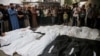 Mourners pray and gather near the bodies of Palestinians killed in Israeli strikes, amid the ongoing conflict between Israel and the Palestinian Islamist group Hamas, during their funeral in Rafah, in the southern Gaza Strip, April 29, 2024.