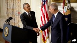 Presidente Barack Obama y fiscal general de EE.UU. Eric Holder, el 25 de septiembre, cuando Holder anunció su renuncia.