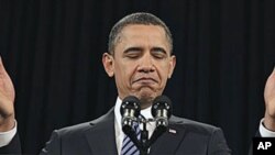 President Barack Obama gestures as he speaks at the US Chamber of Commerce in Washington, February 7, 2011