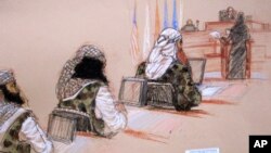 In this pool photo of a sketch by courtroom artist Janet Hamlin and reviewed by the U.S. Department of Defense, three of the five Sept. 11 defendants, from left, Ramzi Binalshibh, Walid bin Attash and the self-proclaimed terrorist mastermind Khalid Sheikh Mohammed, attend a hearing at the Guantanamo Bay U.S. Naval Base in Cuba, Jan. 28, 2013.