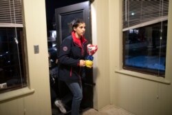 FILE - Jana Hafar arrives home in Bloomfield, N.J., Dec. 3, 2019.