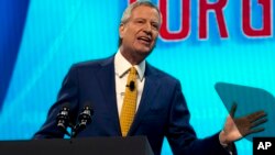 FILE - New York City Mayor Bill de Blasio speaks at an event in Washington, March 25, 2019.