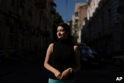 Nelly Isaeva, director of Helping to Leave, stands for a photo in Kyiv, Ukraine, on July 4, 2023. (AP Photo/Jae C. Hong)