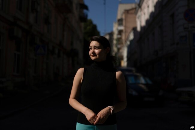 Nelly Isaeva, director of Helping to Leave, stands for a photo in Kyiv, Ukraine, on July 4, 2023. (AP Photo/Jae C. Hong)