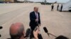 President Donald Trump talks to reporters May 5, 2020, at Andrews Air Force Base in Maryland.