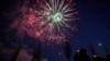 FILE - Visitors use their smartphones to take pictures of fireworks to celebrate the first full moon of the Lunar New Year, in Seoul, South Korea, Feb. 4, 2023.