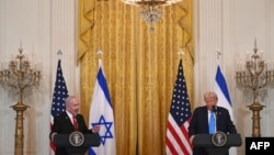 US President Donald Trump listens to Israel's Prime Minister Benjamin Netanyahu during a press conference in the East Room of the White House in Washington, DC, on February 4, 2025.