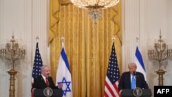 US President Donald Trump listens to Israel's Prime Minister Benjamin Netanyahu during a press conference in the East Room of the White House in Washington, DC, on February 4, 2025.