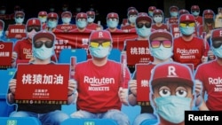 Dummies replaced audience due to the outbreak of the coronavirus disease (COVID-19) at the first professional baseball league game of the season at Taoyuan International baseball stadium in Taoyuan city, Taiwan, April 11, 2020.
