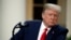 President Donald Trump listens to a question as he speaks about the coronavirus in the Rose Garden of the White House, Monday, April 27, 2020, in Washington. (AP Photo/Alex Brandon)