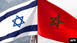 This combination of file pictures created on Dec. 10, 2020, shows a Moroccan flag, right, off the coast of the city of Cayenne on March 21, 2012, and an Israeli national flag on Sept. 23, 2020. 