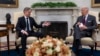 U.S. President Joe Biden, right, meets with Slovenia's Prime Minister Robert Golob, left, in the Oval Office of the White House in Washington, Oct. 22, 2024.