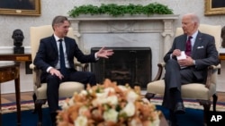 U.S. President Joe Biden, right, meets with Slovenia's Prime Minister Robert Golob, left, in the Oval Office of the White House in Washington, Oct. 22, 2024.