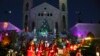 Men dressed as Santa Claus celebrate the upcoming Christmas in Jiyeh village.