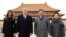 President Donald Trump, second left, first lady Melania Trump, left, Chinese President Xi Jinping, second right, and his wife Peng Liyuan, right, stand together as they tour the Forbidden City, Nov. 8, 2017, in Beijing, China. 