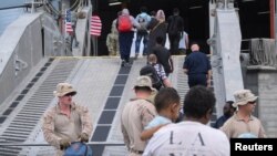 American nationals board a U.S. Navy ship, in Port Sudan