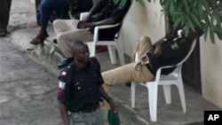 Unidentified policemen on guard duty to provide security against kidnapping rings in Nigeria. (File Photo)